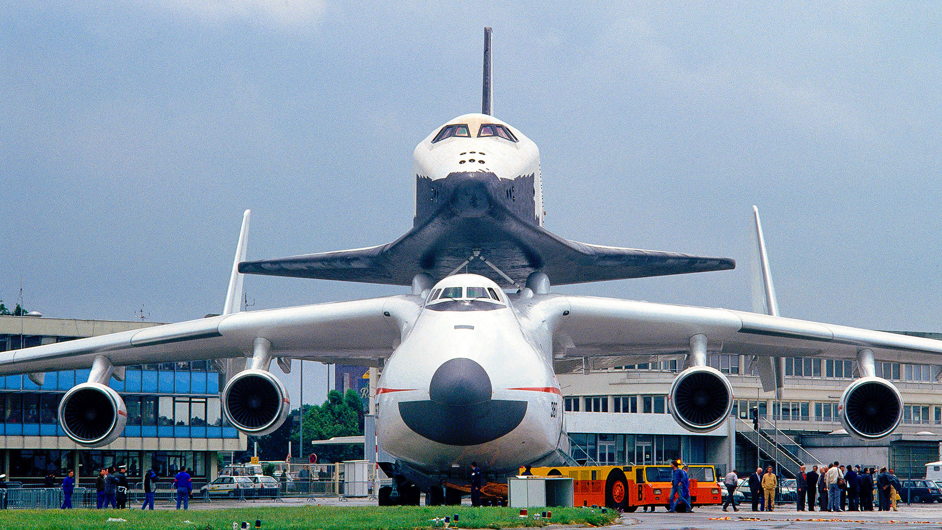 Antonov An-225 Mriya Cossack being towed by a tug with a towbar at the 1989 Paris Airshow with the Soviet Buran space shuttle on its back
