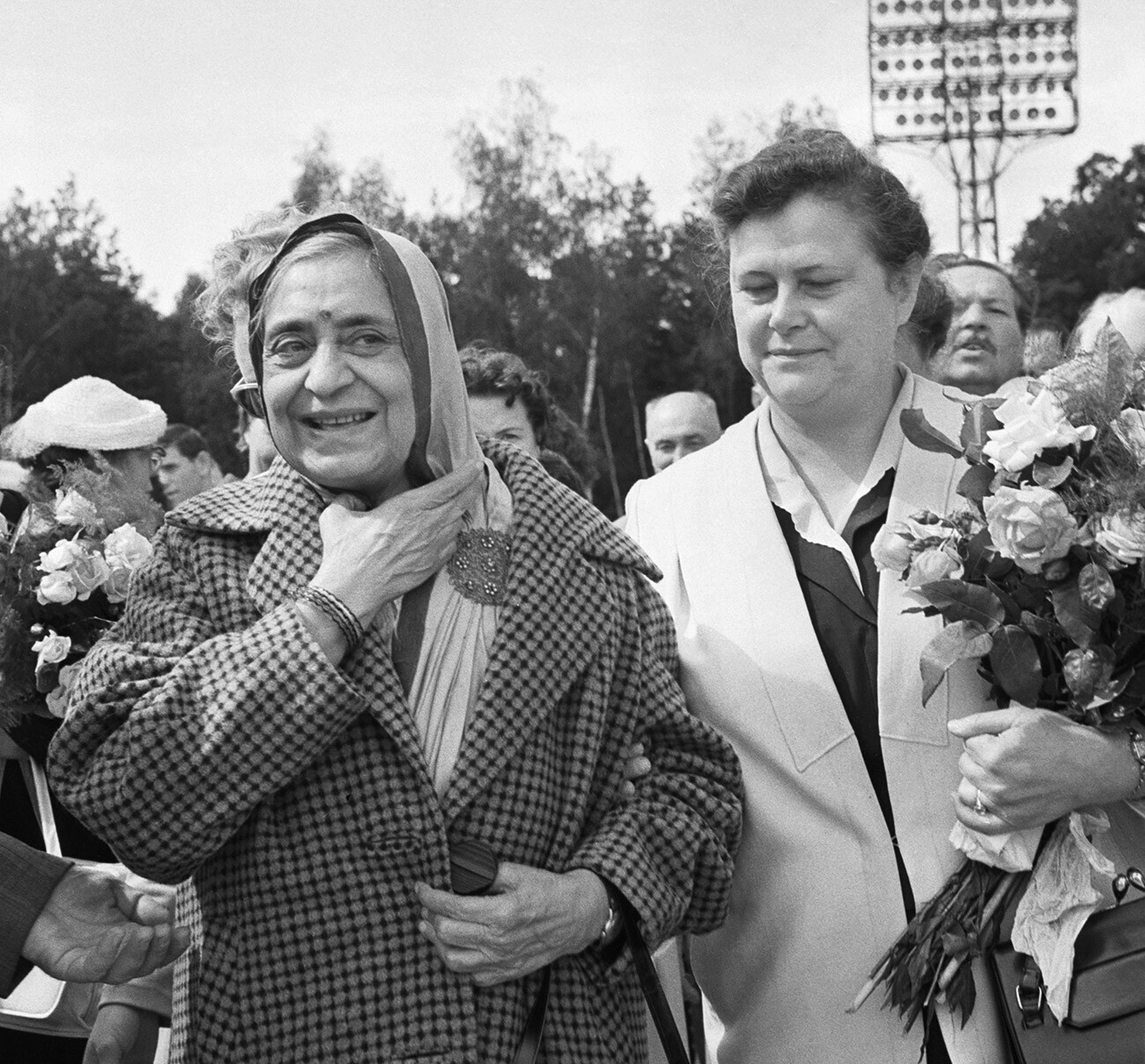 Member of the Soviet Peace Committee's Presidium Nina Popova (right) meets Rameshwari Nehru at Moscow airport, 1961