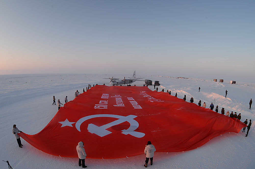 A delegation of the Largest Banner of Victory peace mission unveil a 1,056 square meter copy of the Banner of Victory on the North Pole ahead of celebrations of the 71st anniversary of the Great Victory.
