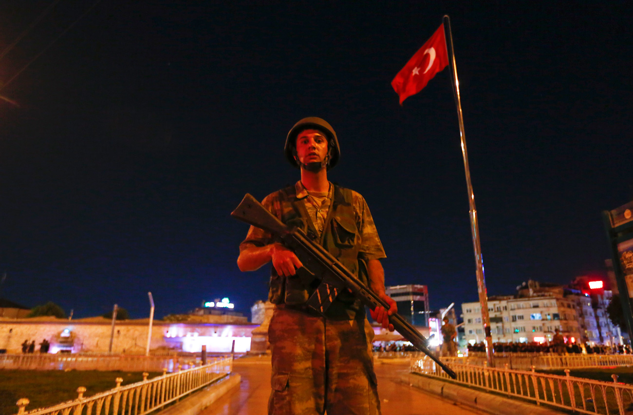 A Turkish military stands guard near the Taksim Square in Istanbul, Turkey, July 15, 2016.