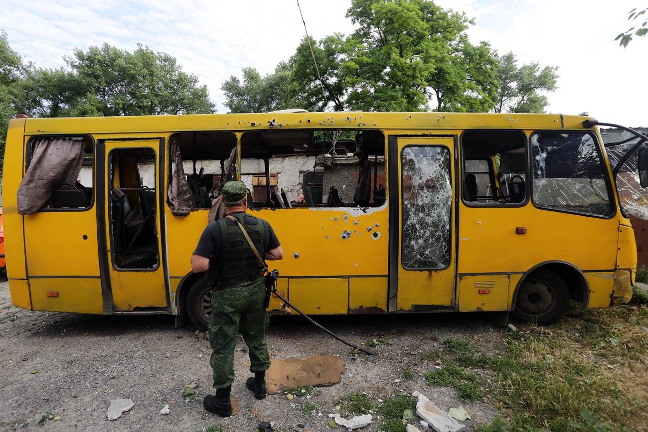 A bus riddled with bullets in the Kuibyshevsky District