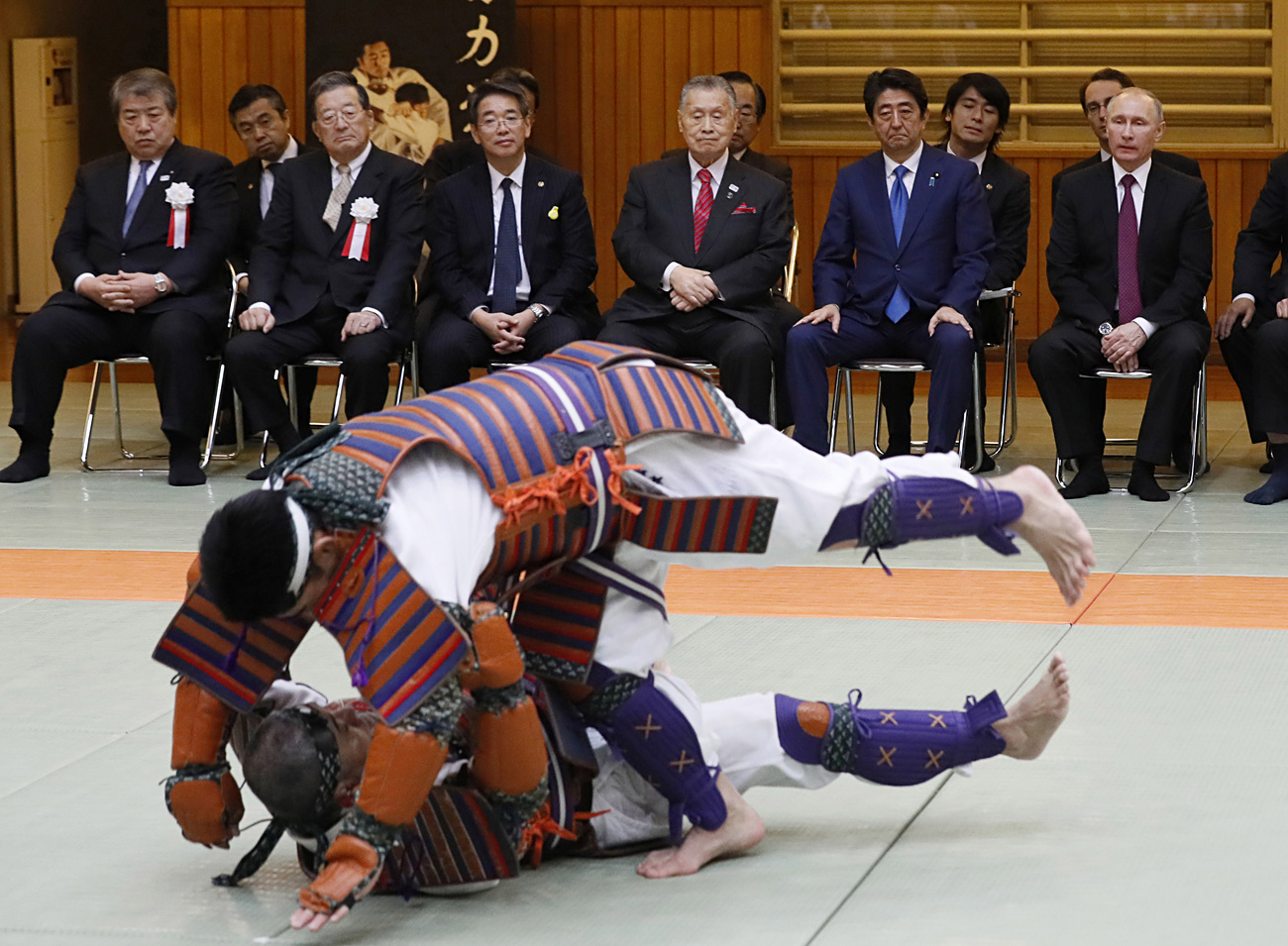 Russian President Vladimir Putin and Japanese Prime Minister Shinzo Abe watch a demonstration during their visit at Kodokan judo hall in Tokyo, Japan. 